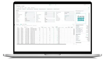 Laptop with cargo management screen in unitop: container data, ETD/ETA dates and document lines