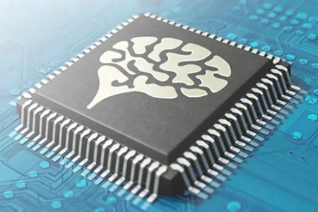 Visualisation of the AI add-on for unitop: stylised chip with brain structure on blue circuit board