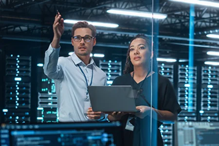 Illustrative image: Consultants by server racks for GOB IT infrastructure consultancy at client site