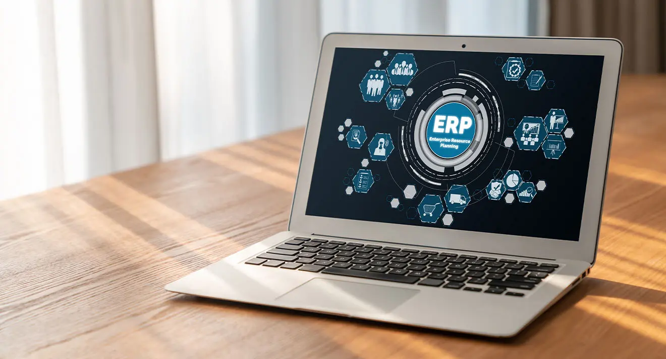 Was ist ein ERP-System? Visualisierung der ERP-Funktionen auf einem Laptop mit moderner Grafik.