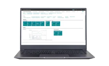 Laptop with ‘unitop Variant Production’ roller centre in Business Central, with Power BI.