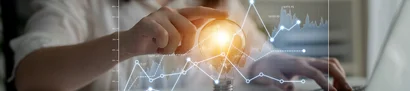 We make BI technologies usable – through our BI consultancy services Iconic image: hand typing on laptop, with lines and a light bulb above it to symbolise a BI idea.